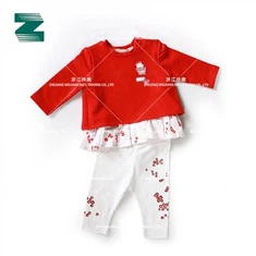 Topp for barn i strikket jersey med trykk vevd poplin volangbunn